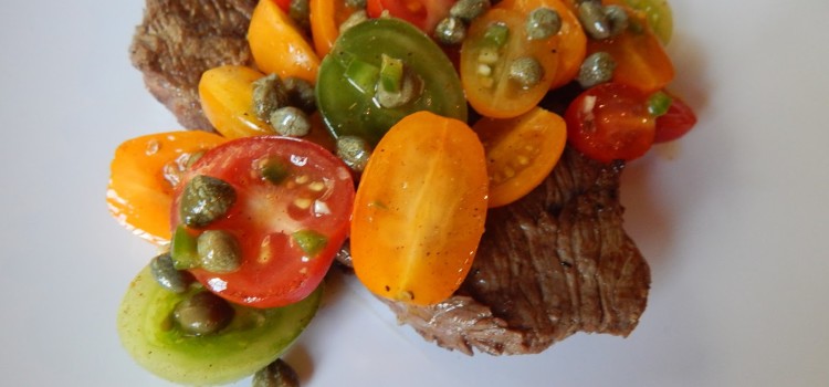 Steak with Tomato Caper Relish from the Nerdy Chef